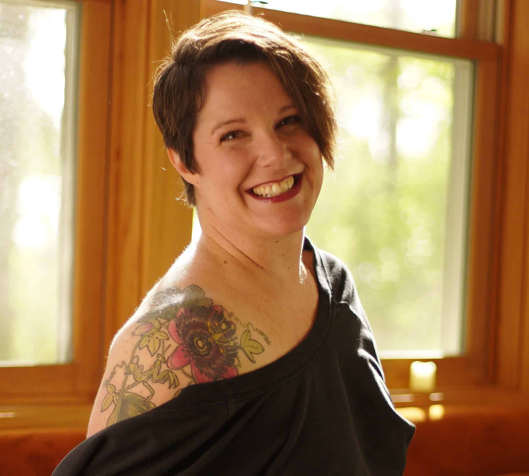 A woman with tattoo on her arm